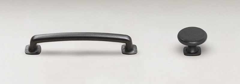 Black pull and round knob pull.