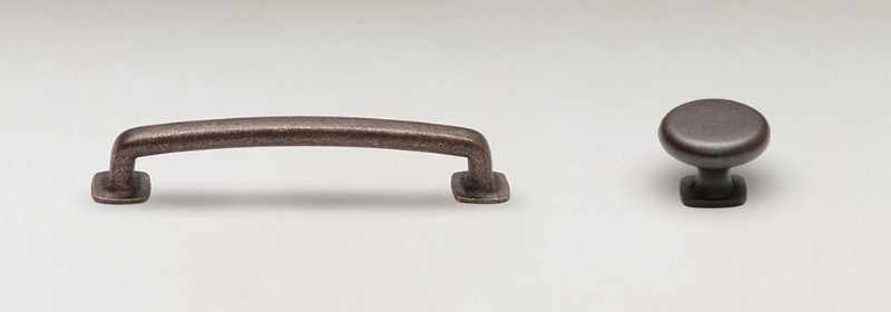 Antiqued bronze pull and round knob.
