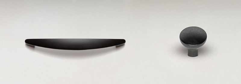 Black rounded handle and round knob pull.