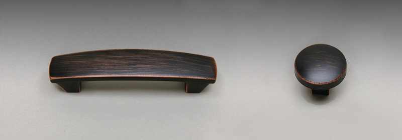 Oil rubbed bronze finish knob and pull.