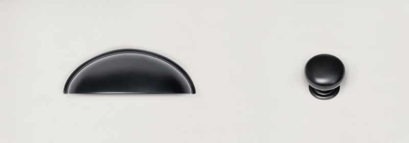 Black knob and pull.