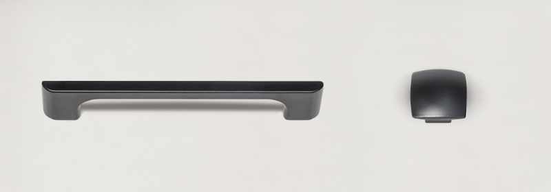 Large black finish pull and knob.