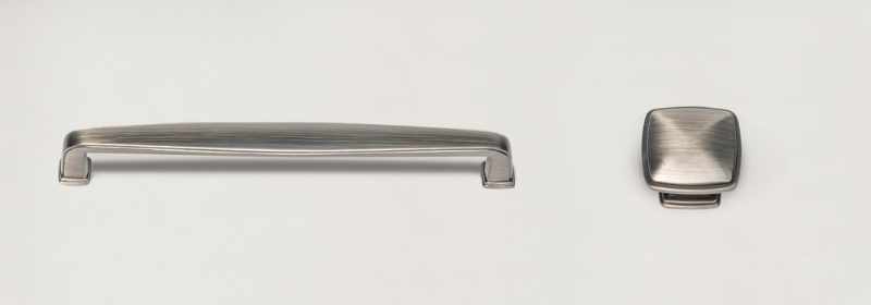 Large, nickel finish door/drawer hardware.