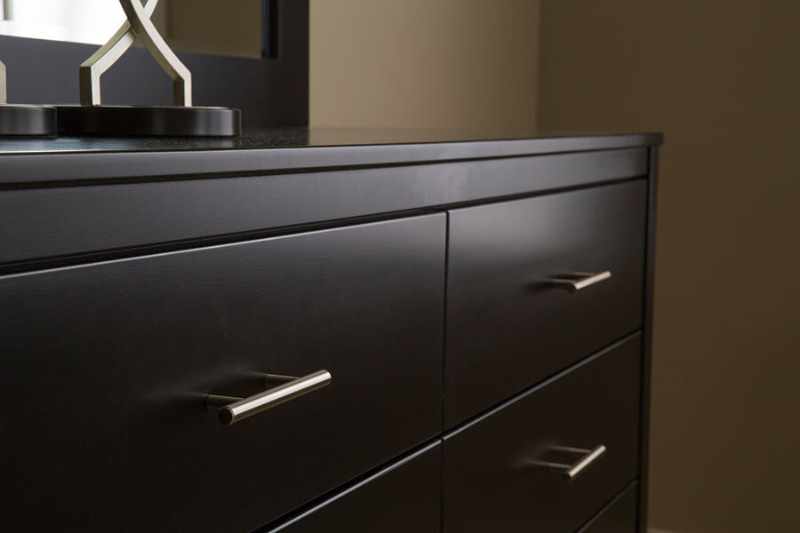 Dresser finished with a dark paint.