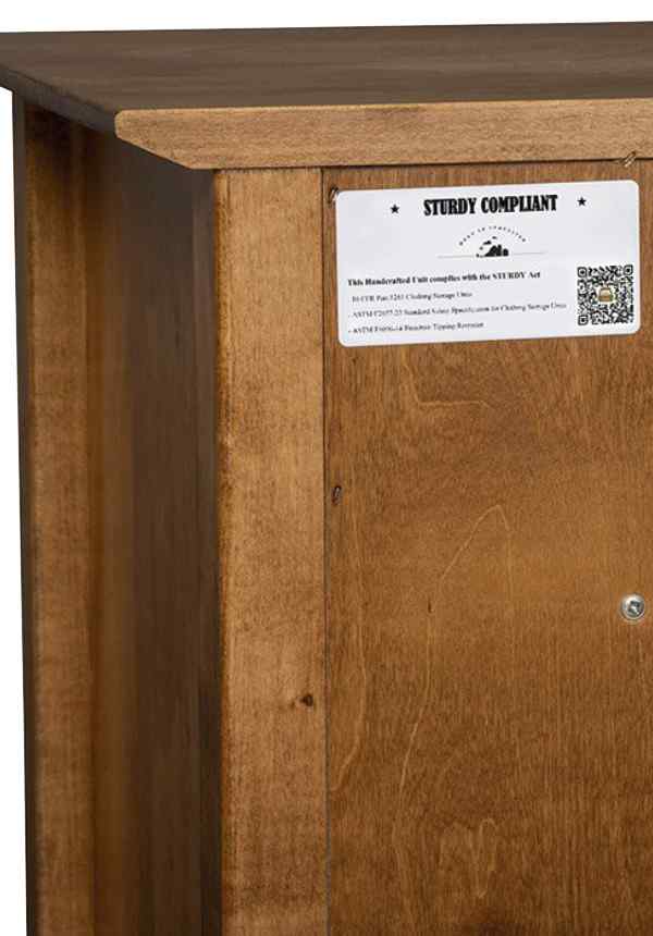Back of dresser showing sturdy compliant label.