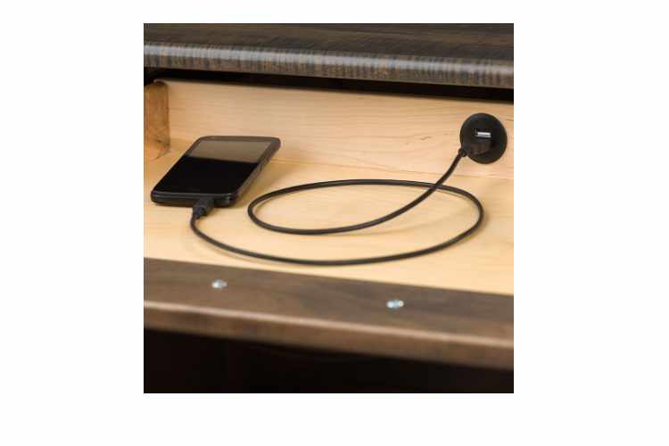 Detail view of built-in USB hub, shows plugged in smart phone.