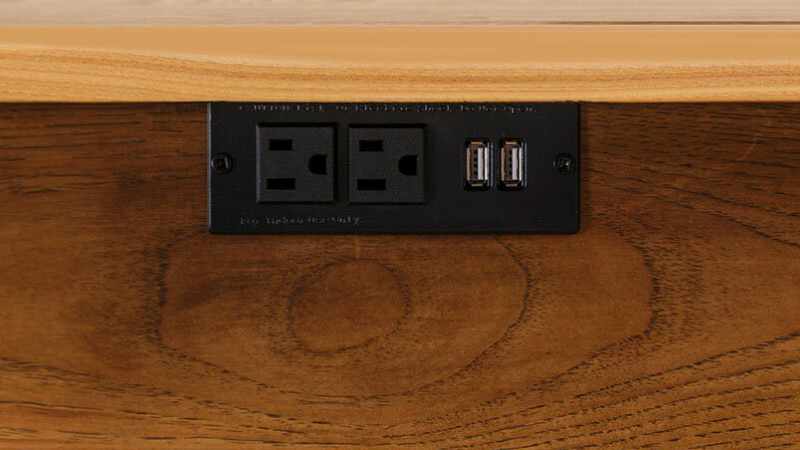 Bult into furniture rectangular power strip with 2 AC outlets and 2 USB ports.