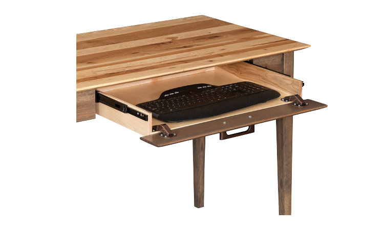 Desk drawer open to show space for keyboard.