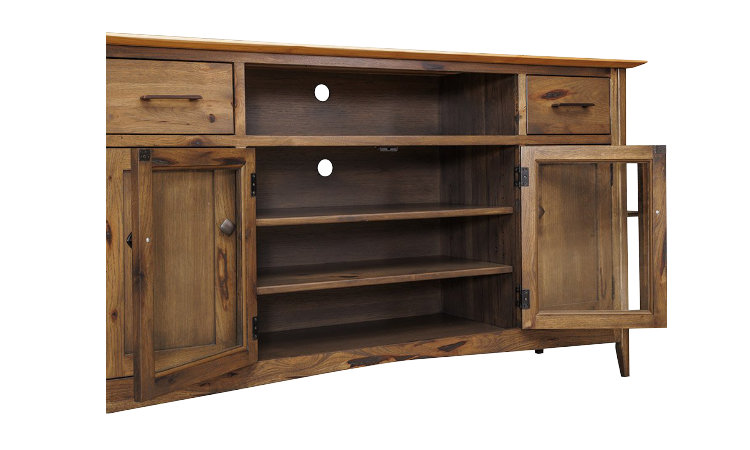Detail view of entertainment center with open doors, showing wiring holes in back.