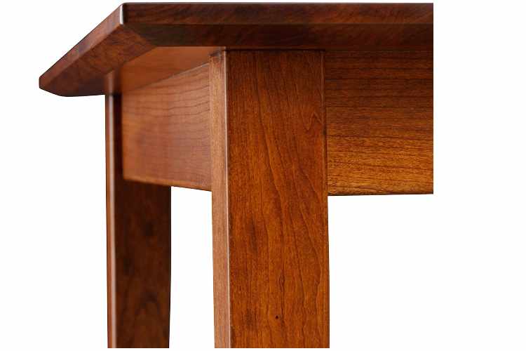 Detail view of dining table edge.