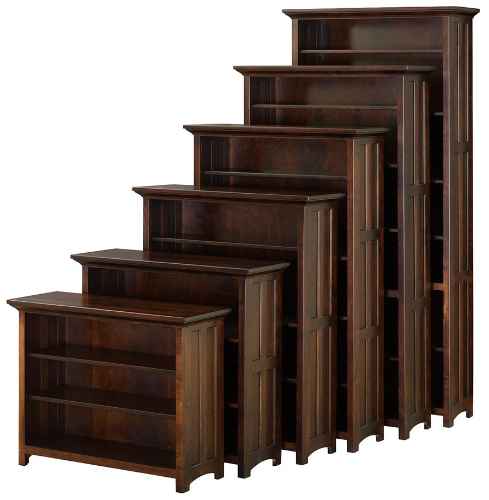 6 bookcases in different sizes stacked against each other.