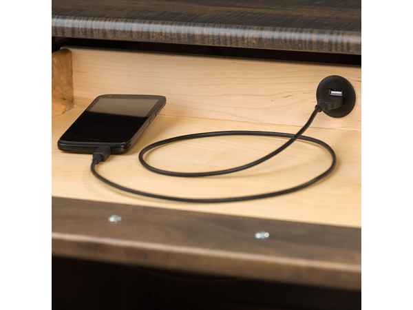 Closeup of optional USB charging port inside keyboard drawer.