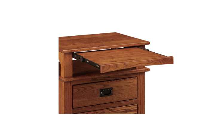 Closeup view of pullout tray above top drawer of nightstand.
