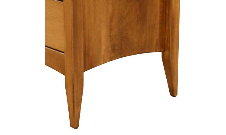 Closeup view of dresser bottom arched side and tapered legs.