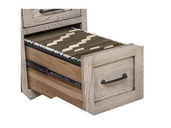 Closeup view of open file drawer.