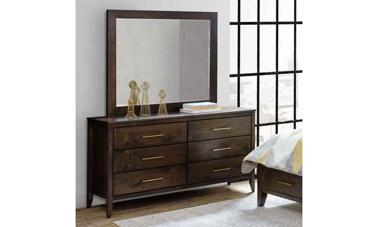 Dresser shown with bed in room setting.