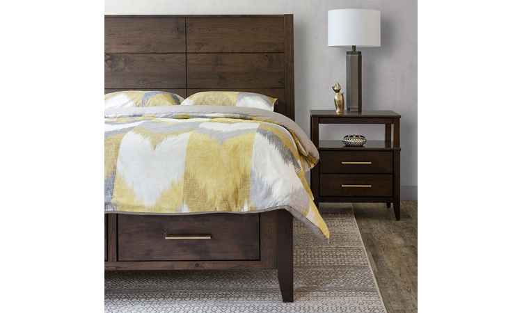 Closeup view of bed with nightstand.