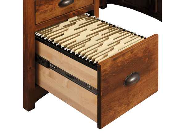 Closeup of open file drawer.