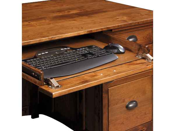 Closeup of open keyboard drawer with keyboard (not included).
