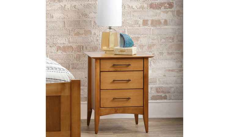 Nightstand and bed in room setting.