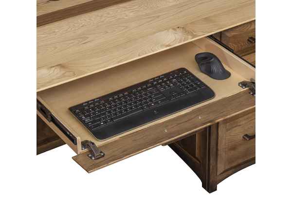 Closeup od open keyboard drawer with keyboard (not included).