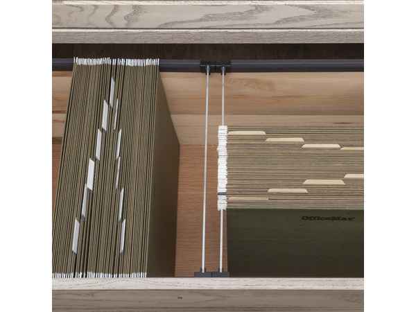 Closeup of open file drawer with legal and letter size files.